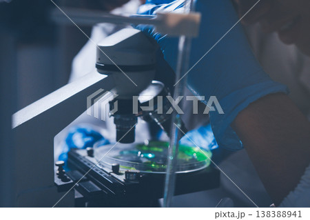 Science, laboratory and woman with pipette, test tube and biotech solution in research. Medical innovation, scientist or lab technician in study for healthcare, medicine and vaccine results feedback. 138388941