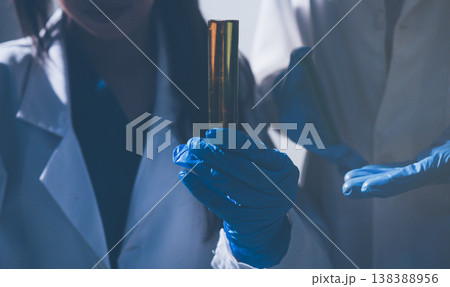Science, laboratory and woman with pipette, test tube and biotech solution in research. Medical innovation, scientist or lab technician in study for healthcare, medicine and vaccine results feedback. Science, laboratory and woman with pipette, test tube and biotech solution in research. Medical innovation, scientist or lab technician in study for healthcare, medicine and vaccine results feedback. 138388956