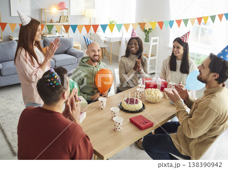 Friends Celebrating Birthday Party With Cake Friends Celebrating Birthday Party With Cake 138390942