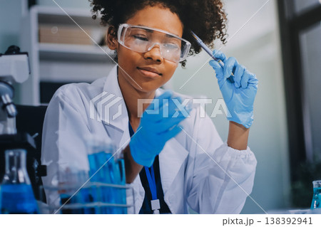 Researchers working in the clinical laboratory Researchers working in the clinical laboratory 138392941