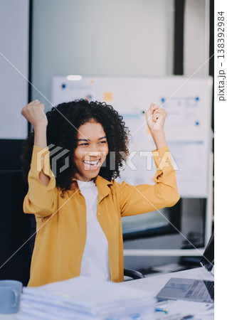 Pretty female freelancer working on laptop while sitting on modern coworking background Pretty female freelancer working on laptop while sitting on modern coworking background 138392984