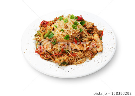 Asian food. Fried Thai Rice noodles with meat and vegetables. Chinese rice vermicelli with meat, parsley and peppers. Asian food. Fried Thai Rice noodles with meat and vegetables. Chinese rice vermicelli with meat, parsley and peppers. 138393292