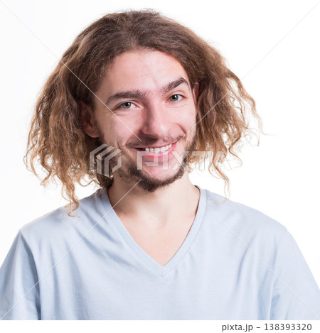 Young man with happy facial expression staring direct to camera on white isolated studio background Young man with happy facial expression staring direct to camera on white isolated studio background 138393320