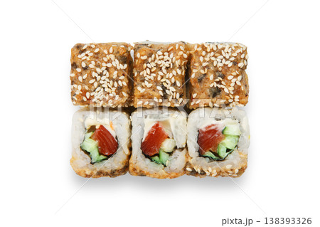 Japanese food restaurant delivery - tempura sushi rolls california with fish, avocado and cheese isolated at white background. Sushi rolls top view, flat lay. 138393326