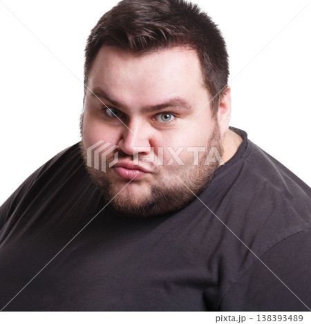 Feeling furious. Fat man expressing anger, white isolated studio background Feeling furious. Fat man expressing anger, white isolated studio background 138393489
