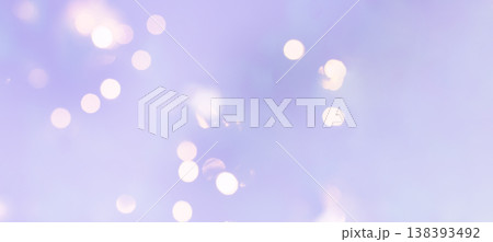 Pastel purple bokeh background with sparkling glitter lights. Glowing bokeh lights creating an abstract, festive, and soft blue background, perfect for celebrations and holidays Pastel purple bokeh background with sparkling glitter lights. Glowing bokeh lights creating an abstract, festive, and soft blue background, perfect for celebrations and holidays 138393492