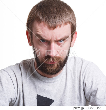 Can't believe it. Surprised man expressing amaze on face, standing on white isolated background, studio shot 138393555