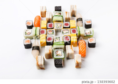Japanese food restaurant delivery - sushi maki, unagi, tuna and california roll big party platter set isolated on white background, above view 138393602