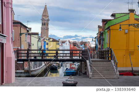 Colorful canal street with boats and bell tower Colorful canal street with boats and bell tower 138393640