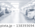 Abstract Blurred Parking Garage Background with Cars and Light 138393694