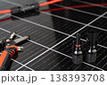 Solar panel connector cable and MC4 plug installation tools on photovoltaic surface 138393708