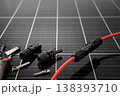 Solar panel connector cable and MC4 plug installation tools on photovoltaic surface 138393710