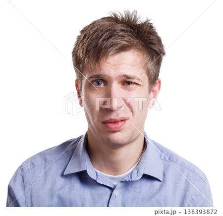 Emotions, facial expressions. Man expressing disgust while standing on white isolated studio background, copy space Emotions, facial expressions. Man expressing disgust while standing on white isolated studio background, copy space 138393872