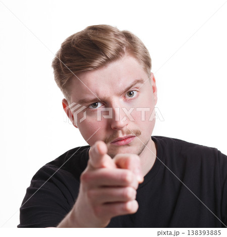Shame on you. Strict man gesturing with index finger on camera, white isolated studio background Shame on you. Strict man gesturing with index finger on camera, white isolated studio background 138393885