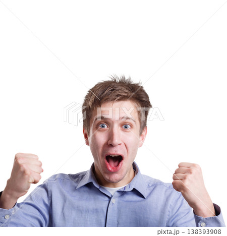 Winner celebrates. Great success. Excited man with happy facial expression shout on white isolated studio background Winner celebrates. Great success. Excited man with happy facial expression shout on white isolated studio background 138393908