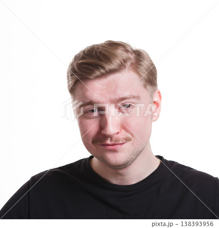Mistrustful man with sly smile, makes fun of something. Facial expressions, portrait isolated on white Mistrustful man with sly smile, makes fun of something. Facial expressions, portrait isolated on white 138393956