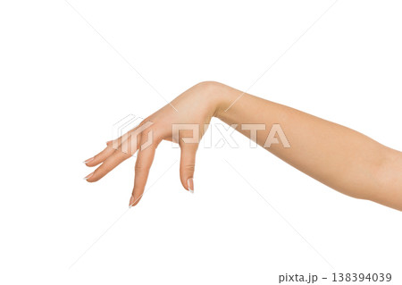 Close-up of female hand making gesture while picking up some items on white isolated background, cutout, copy space 138394039