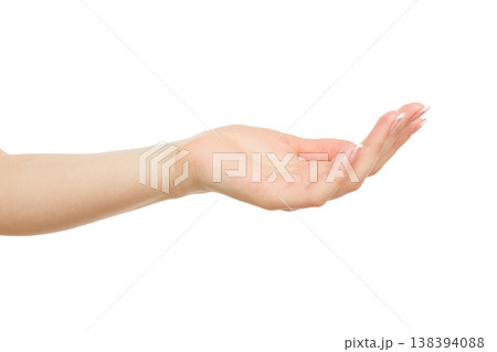 Woman's hand keeping empty cupped palm, close-up, cutout, isolated on white background. Offering or begging concept. 138394088