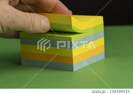 paper for notes on green paper, stationery made of thin paper with glue on one side for ease of use and gluing paper for notes on green paper, stationery made of thin paper with glue on one side for ease of use and gluing 138394555