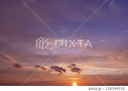 Beautiful multi-colored sunset with different colors and clouds , multi-colored sky with warm colors and a touch of sunset or sunrise Beautiful multi-colored sunset with different colors and clouds , multi-colored sky with warm colors and a touch of sunset or sunrise 138394558