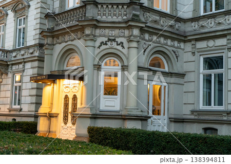 Puget Palace in Krakow Poland old house facade architecture. Wall windows. Entrance door 138394811