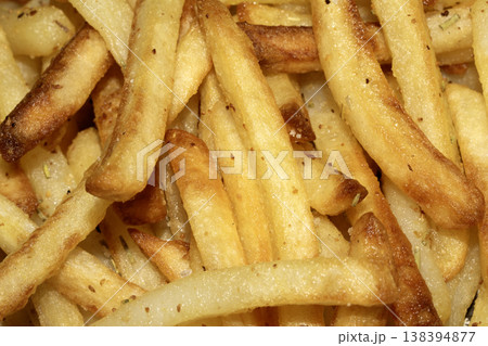 Close up of golden french fries chips fried potatoes tasty junk food 138394877