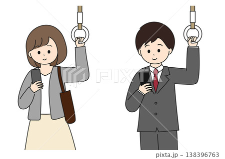 通勤中の電車でスマートフォンを見るビジネスマンの男女 138396763
