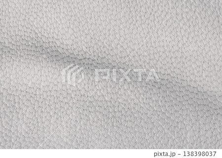 Natural gray leather as a background macro photo. Natural gray leather as a background macro photo. 138398037