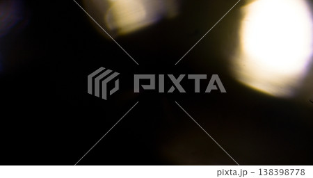 Abstract cinematic lens flare with bright light burst and star rays, isolated on black background. Optical light effect ideal for VFX overlays, transitions, titles and dramatic visual accents. Abstract cinematic lens flare with bright light burst and star rays, isolated on black background. Optical light effect ideal for VFX overlays, transitions, titles and dramatic visual accents. 138398778