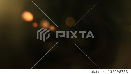 Abstract cinematic lens flare with bright light burst and star rays, isolated on black background. Optical light effect ideal for VFX overlays, transitions, titles and dramatic visual accents. 138398788