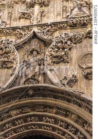 Intricate stone carvings adorn the facade of a historic building in Malaga, Spain, reflecting rich cultural heritage and artistic craftsmanship Intricate stone carvings adorn the facade of a historic building in Malaga, Spain, reflecting rich cultural heritage and artistic craftsmanship 138400971