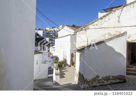 Exploring the narrow streets and white buildings of Setenil de las Bodegas in Spain on a sunny day Exploring the narrow streets and white buildings of Setenil de las Bodegas in Spain on a sunny day 138401022