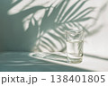Minimal Glass of Water on Light Background in Soft Tropical Sunlight, Clean Aesthetic 138401805