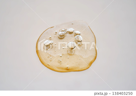 Viscous clear liquid gel spread with bubbles Viscous clear liquid gel spread with bubbles 138403250