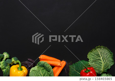 Fresh vegetables border on black background. Vegetarian cooking. Healthy natural food with copy space. 138403865
