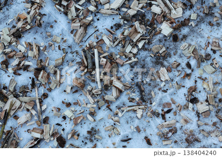 Wood Chippings On The Snowy Ground Wood Chippings On The Snowy Ground 138404240