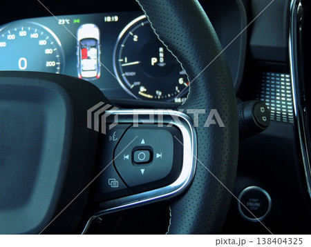 Menu interface and voice control buttons on the steering wheel in car Menu interface and voice control buttons on the steering wheel in car 138404325