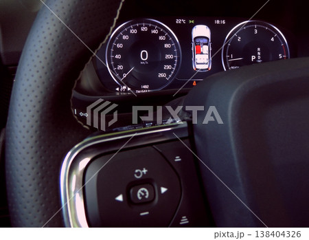 Car dashboard and controls buttons of cruise control on the steering wheel Car dashboard and controls buttons of cruise control on the steering wheel 138404326
