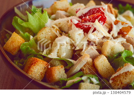 classic Caesar salad, close-up, natural light, selective focus, horizontal, 138404579