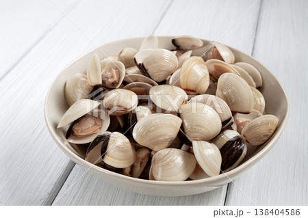freshly frozen vongole clams, on a light plate, top view, no people, freshly frozen vongole clams, on a light plate, top view, no people, 138404586