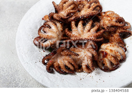 Baby octopus grilled on a white plate, homemade, no people, Baby octopus grilled on a white plate, homemade, no people, 138404588