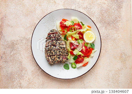 fillet of red tuna meat, fried in sesame seeds, homemade, close-up, no people, fillet of red tuna meat, fried in sesame seeds, homemade, close-up, no people, 138404607
