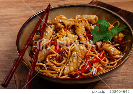 udon noodles, with squid and vegetables, on a wooden table, homemade, no people, 138404643