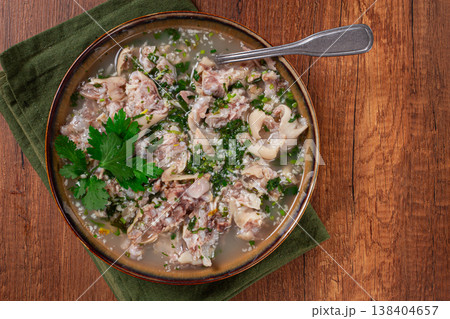 Muzhuzhi, a Georgian dish made from pork legs, with spices and herbs, homemade Muzhuzhi, a Georgian dish made from pork legs, with spices and herbs, homemade 138404657