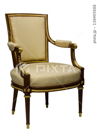 Exquisite vintage chair with elegant design and golden accents from a bygone era in a bright room 138405688
