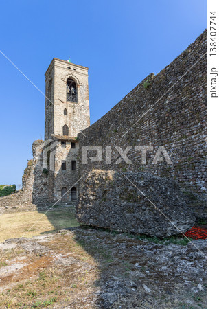 Cavriana castle tower and stone wall in Italy 138407744