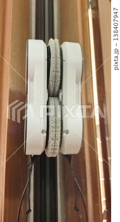 Robot cleaner operates on window tracks to achieve spotless shine without hassle 138407947