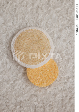 Absorbent Ecofriendly Reusable Sponges Exhibiting Tactile Softness On Plush White Background Absorbent Ecofriendly Reusable Sponges Exhibiting Tactile Softness On Plush White Background 138408474