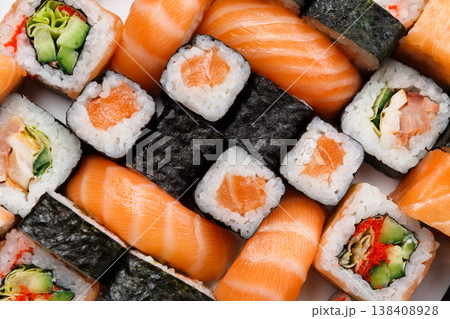 Sushi and rolls pattern background, japanese restaurant delivery top view. Salmon, unagi, california and other healthy meals 138408928