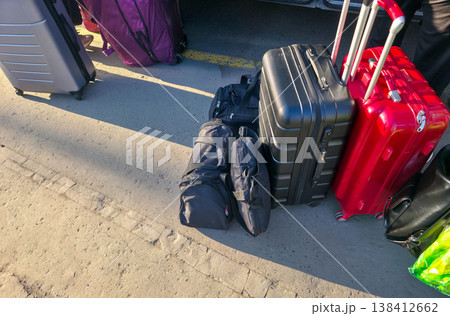 Bags and suitcases are on the road. Traveling with luggage and transporting things. High quality photo Bags and suitcases are on the road. Traveling with luggage and transporting things. High quality photo 138412662